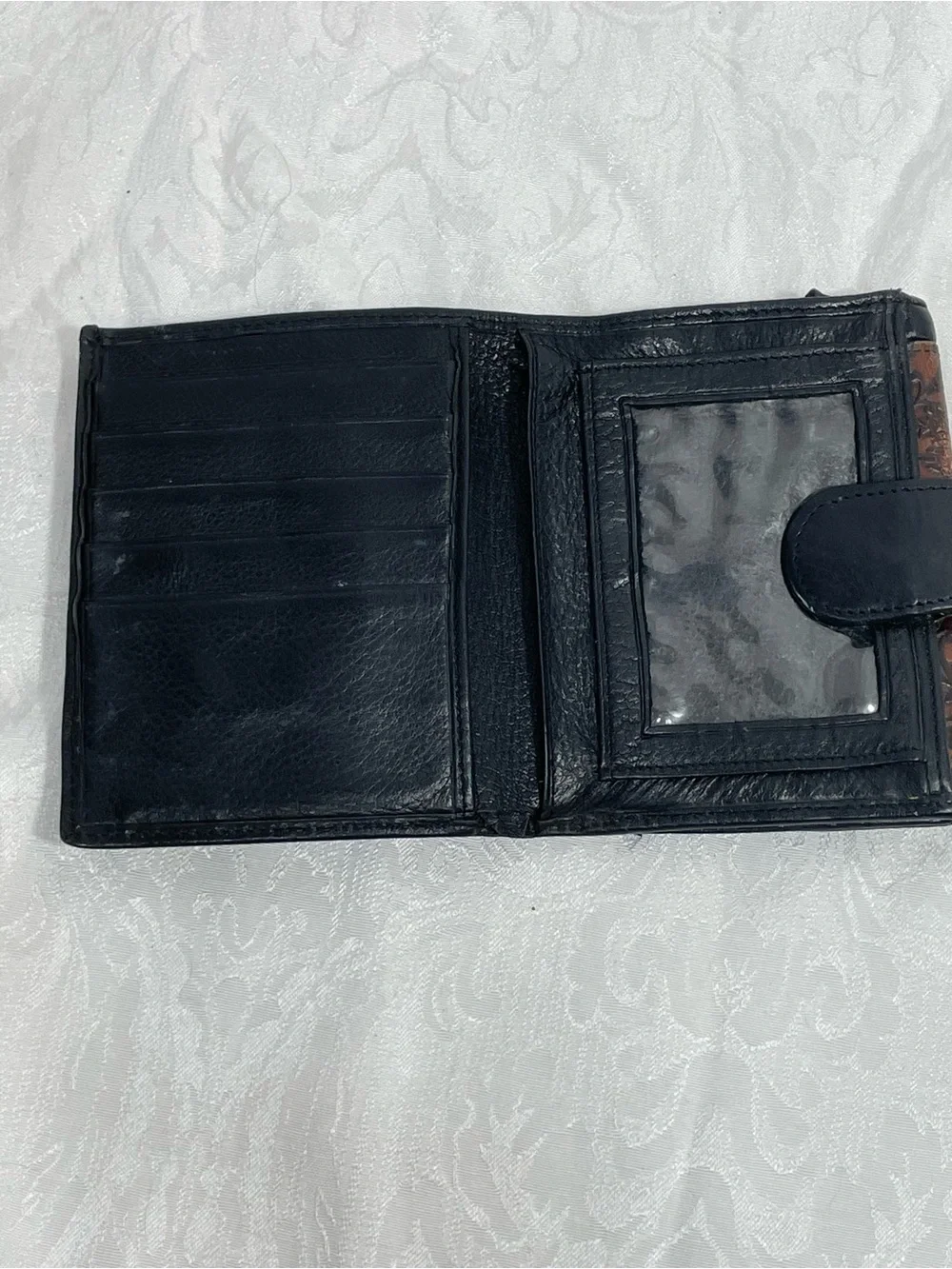 Brighton Vintage Tooled Leather Bifold Wallet in Black and Brown.
